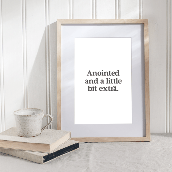 'Anointed and a little bit extra' poster with a White background and white text